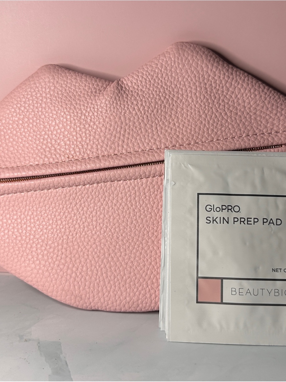 Beatybio Pink Lip-Shaped makeup Bag and 10 packet skin prep pad